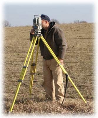 Staking Engineer, Dan Hackleman, prepares for new service.
